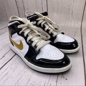 Jordan kids shoes size 2y black gold white